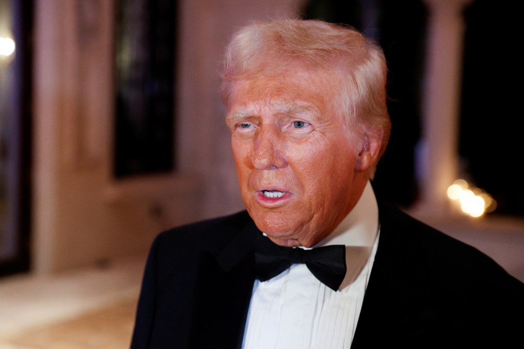 President-elect Donald Trump in a suit and bow tie at a New Year's Eve event at Mar-a-Lago, Palm Beach, Florida on December 31, 2024